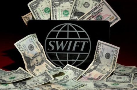 SWIFT discloses more cyber thefts, pressures banks on security
